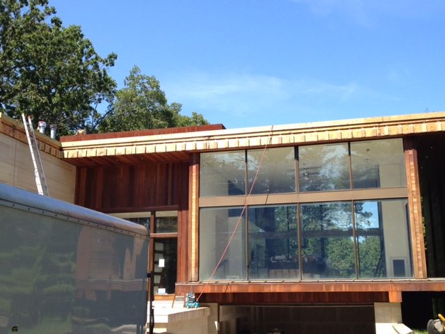 The Mississauga house as-is: exterior under construction with unfinished cladding and exposed framing